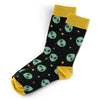 Fun alien patterned novelty crew socks with green aliens, stars, yellow cuffs, and heels