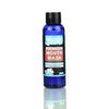 Blue bottle of Anchor Detox mouth wash 2oz with black cap for fresh breath solution