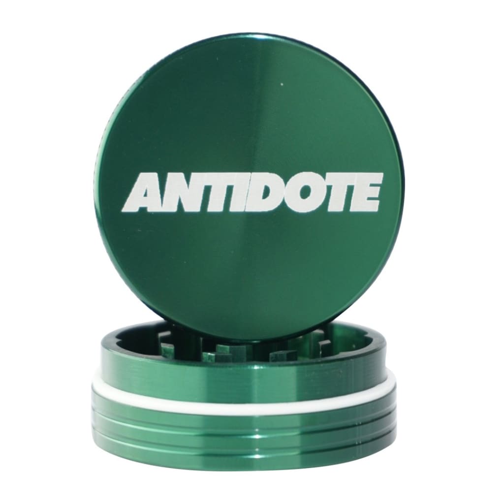 Antidote Green 2-piece Grinder for Efficient Grinding with ’ANTIDOTE’ on top