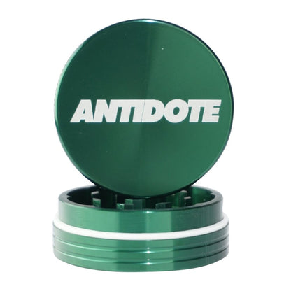 Antidote Green 2-piece Grinder for Efficient Grinding with ’ANTIDOTE’ on top