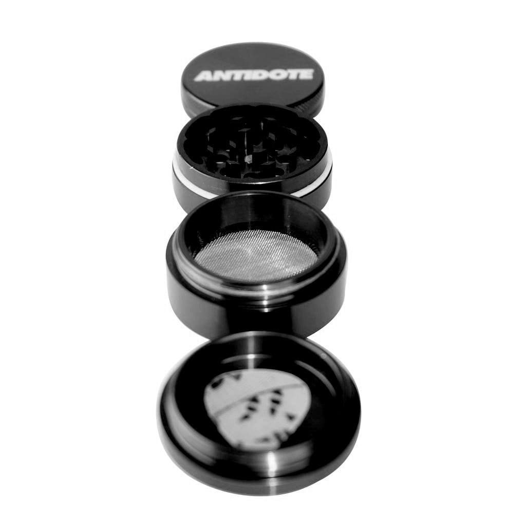 Black Antidote grinder in aircraft grade aluminum, 4-piece metallic herb tool