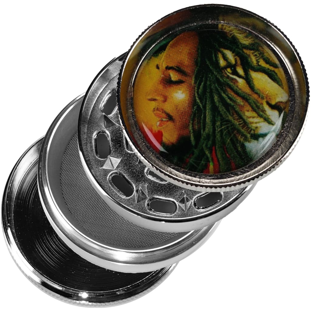 Bob Marley fine toothed metal grinder with pollen screen and vibrant person-lion design on lid
