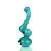 Teal glass bubbler with color frit, featuring zigzag lines and bulbous base