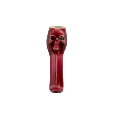 Red skull-shaped glass pipe showcased in Colombian Ceramic Pipes for young smokers