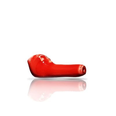 Curved red chili pepper highlighting Colombian Ceramic Pipes with smooth finishes for young smokers