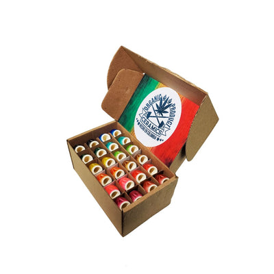 Colorful sewing thread spools in a box with Italian flag label for Colombian Ceramic Pipes