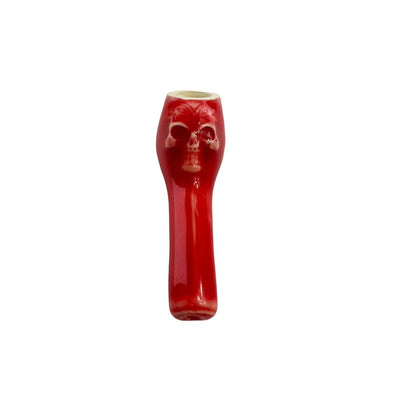 Red Colombian ceramic pipe with a stylized face, perfect for young smokers with smooth finishes