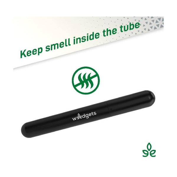 Black aluminum doob tube labeled ’w3edgets’ with green text on a weed pipe with filter tip protection