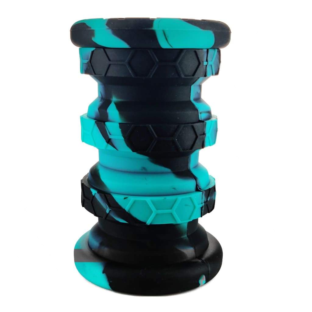 Multicolor extendable silicone jar with black and teal swirls and hexagonal textures
