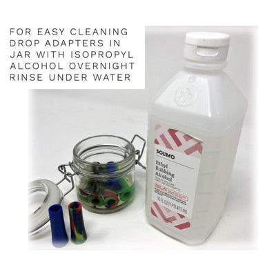 Bottle of Solimo ethyl rubbing alcohol with filter adapter for weed pipes in glass jar