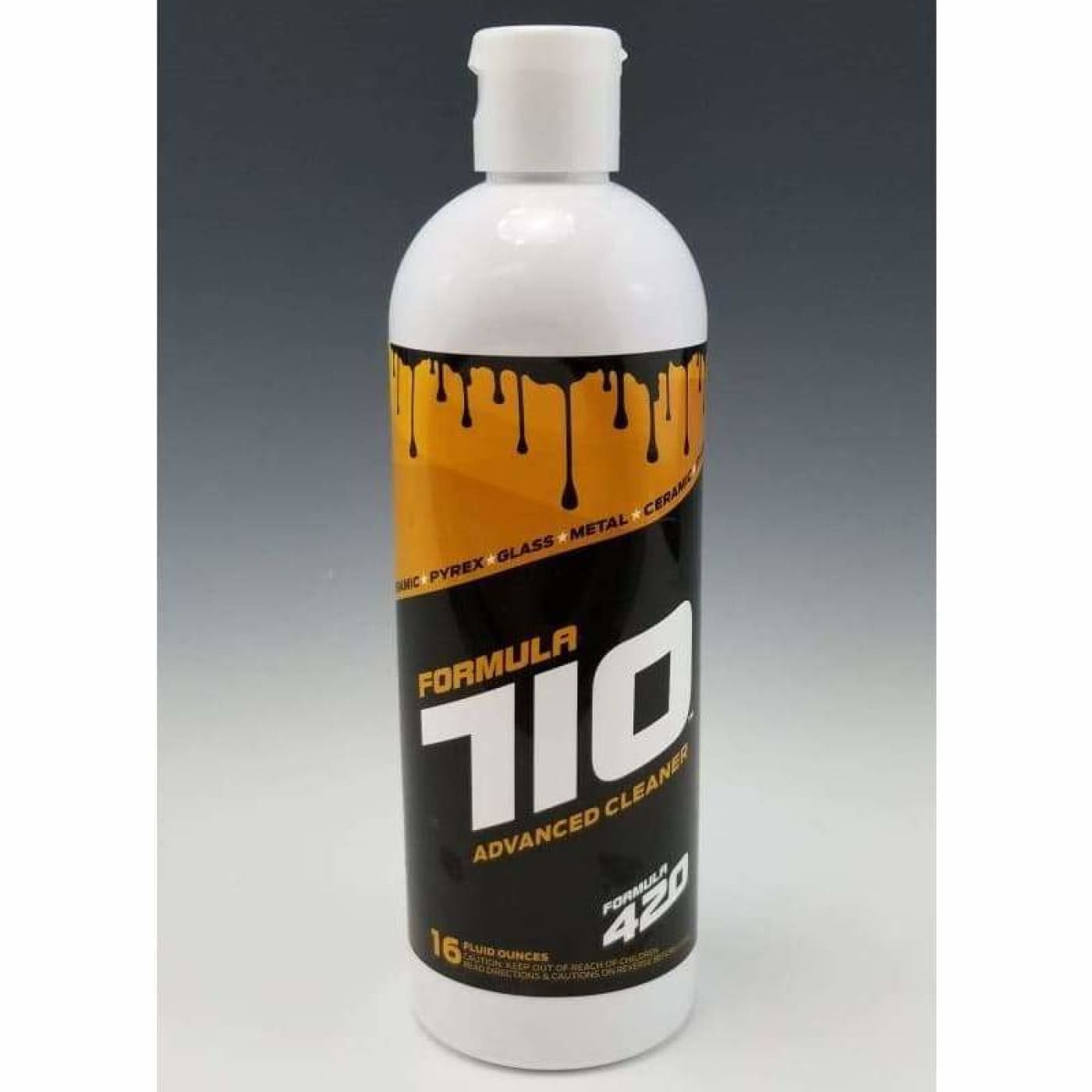 White Formula 710 bottle for cleaning dab rigs and Pyrex glass