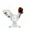 Intricate glass water pipe with multiple chambers in 16 Slot Glass Slide Display for Quartz Bangers