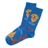 Pair of bright blue socks with funky golden retriever designs and red paw prints