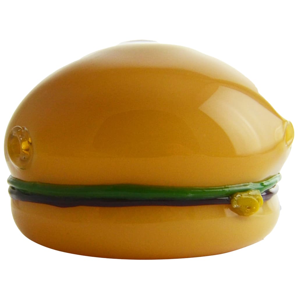 Glossy yellow glass hand pipe shaped like a hamburger with green detailing