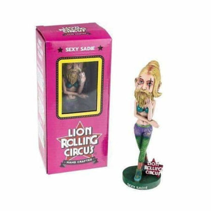 Mermaid-like character figurine in pink box, Lion Rolling Circus collectable bobblehead