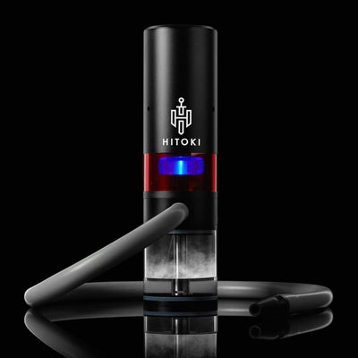 Black Hitoki Trident laser bong with hose and concentrated beam