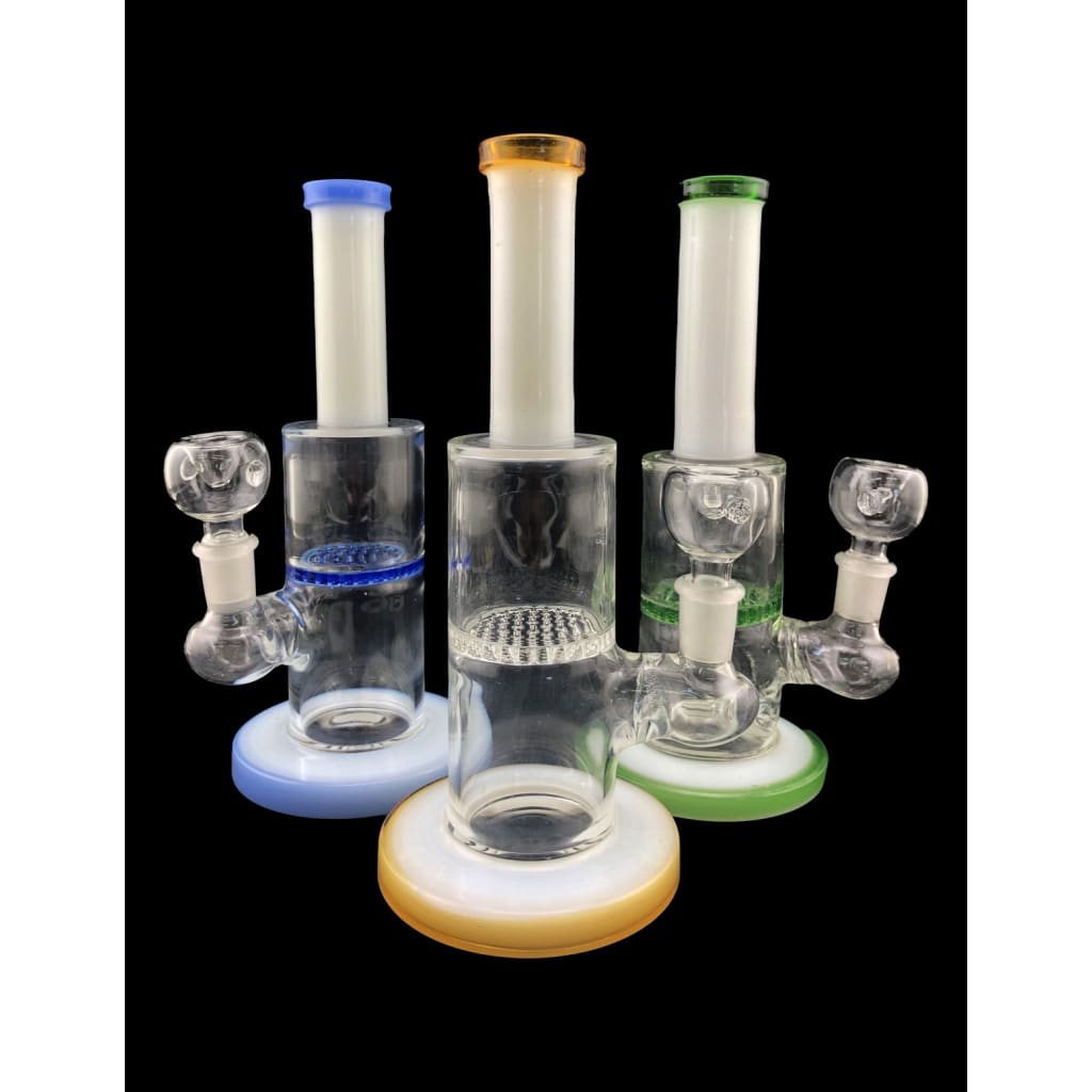Three glass bongs featuring honey comb perc for smooth filtration in a perc water pipe