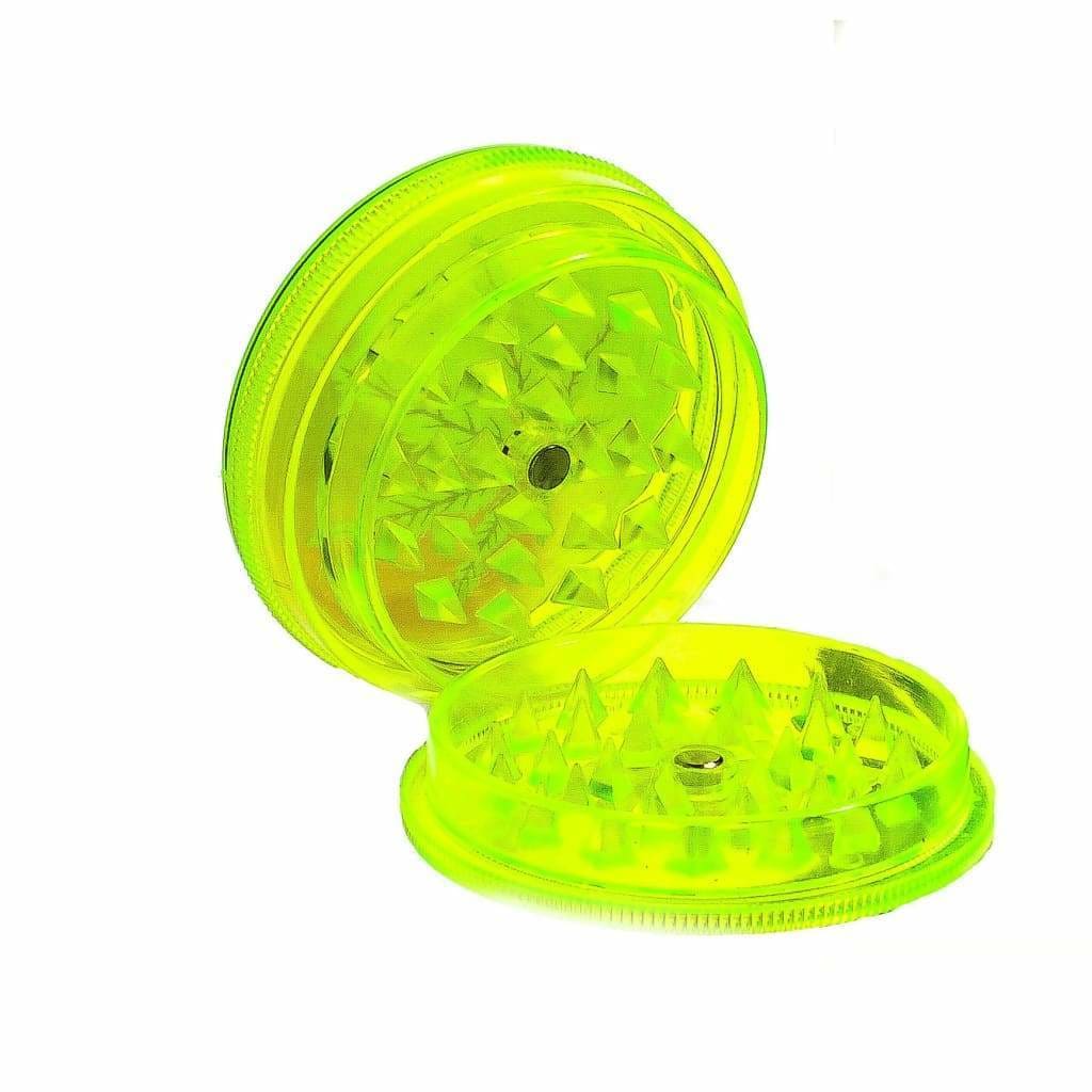 Neon yellow plastic herb grinder leaf print with transparent acrylic construction
