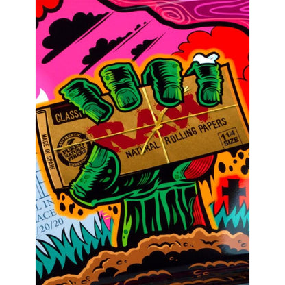 Pack of RAW rolling papers held by a green monster hand on Limited Edition Raw Zombie Large Rolling Tray