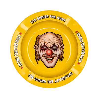 Yellow rolling circus ashtray with creepy clown face; Lion Rolling Circus Ashtrays collection