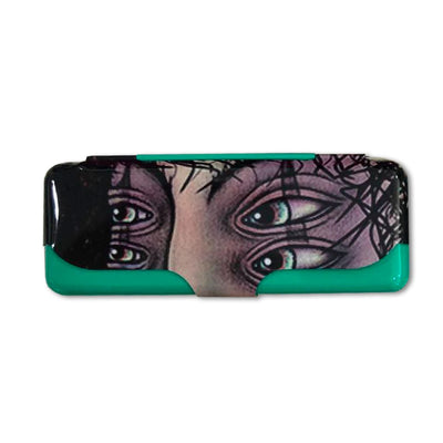 Lion Rolling Circus cover: Eyeglass case with eyes and patterns on a tin rolling tray