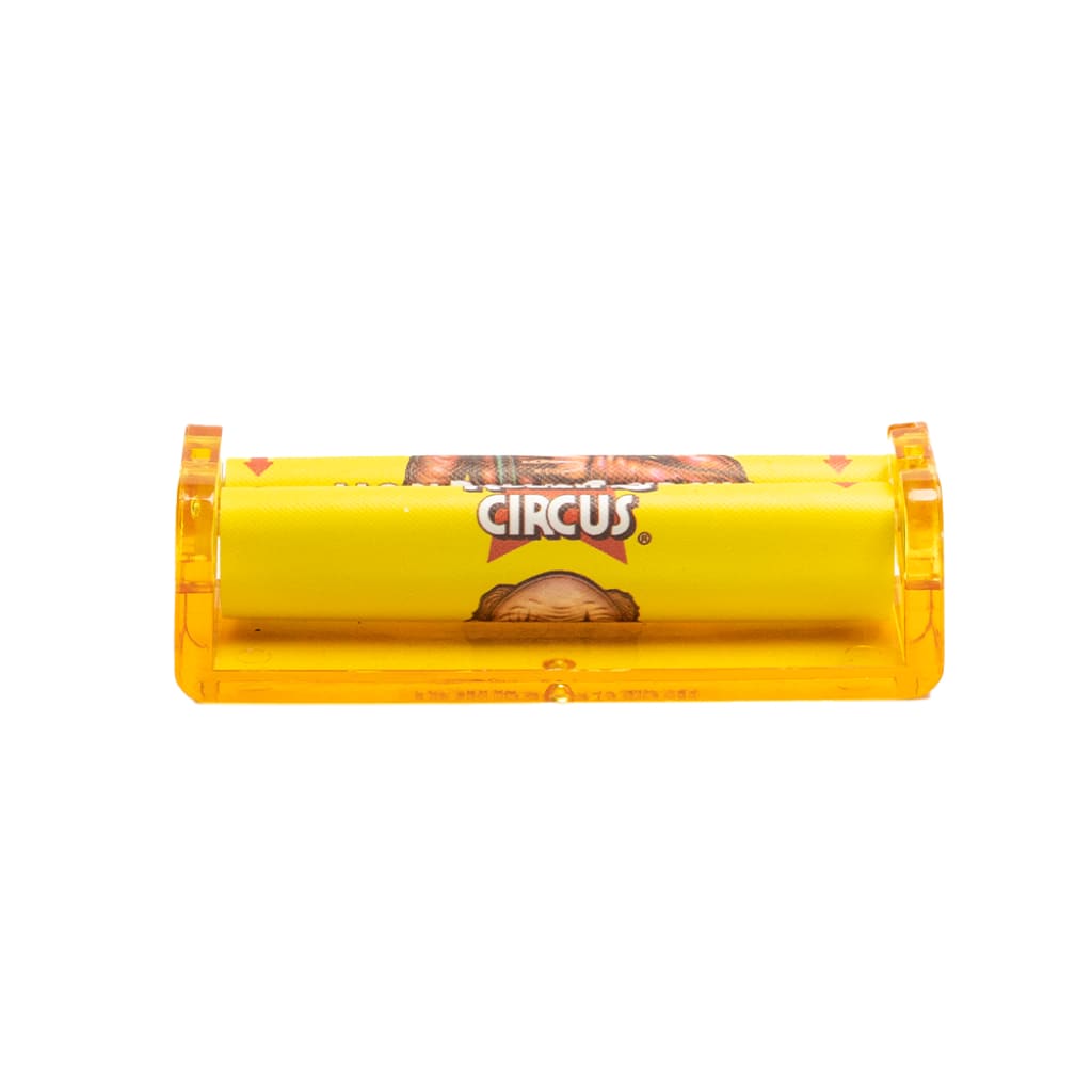 Yellow ’Lion Rolling Circus’ cigarette rolling machine with ’Circus’ branding