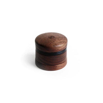 Round wooden container with lid from Marley Natural Wood Grinder, featuring aluminum cutting blades
