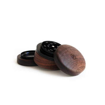 Wooden herb grinder with aluminum cutting blades by Marley Natural, sustainably sourced North American