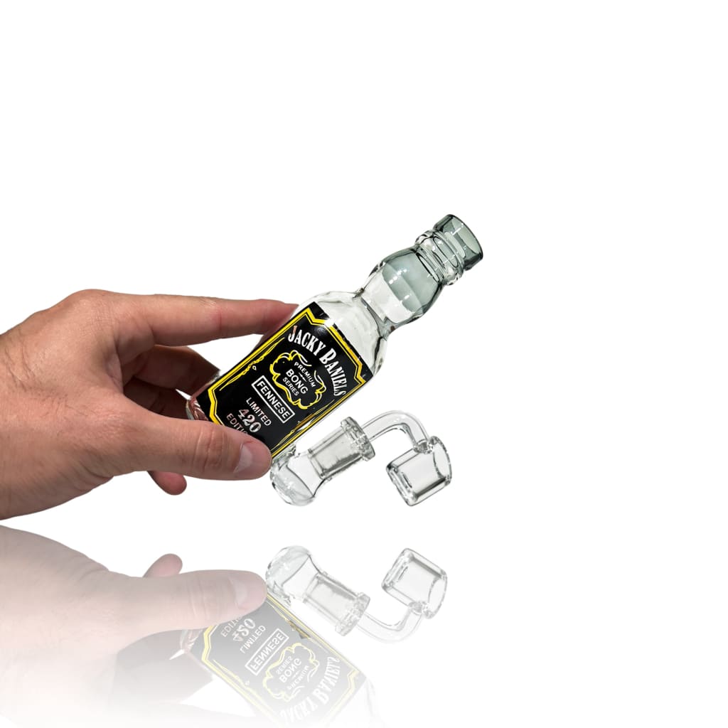 Portable Micro Jacky Rig with Bottle of Jack Daniel’s whiskey and falling ice cubes for outdoor fun
