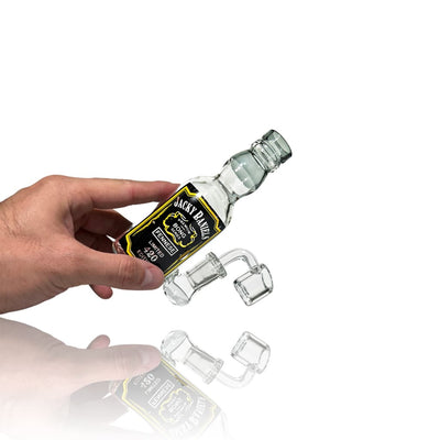 Portable Micro Jacky Rig with Bottle of Jack Daniel’s whiskey and falling ice cubes for outdoor fun