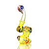 Mini Silver Fume Ring Bubbler: Colorful glass pipe with curved shape and decorative swirls