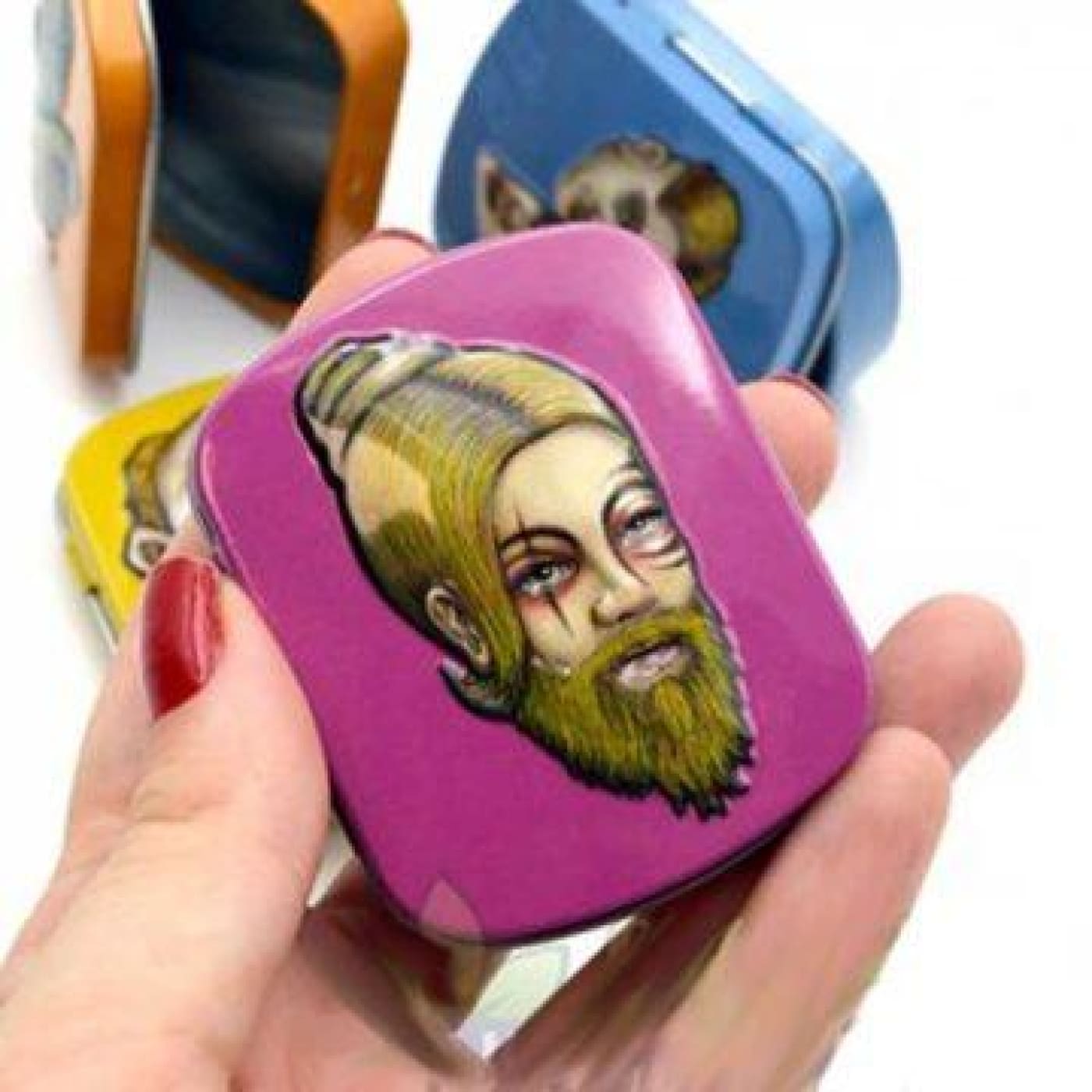 Vibrant pink mini tin box with bearded antique figure design