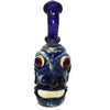 Whimsical blue glass Monster Head Boro Bubbler with bulging eyes and grinning mouth