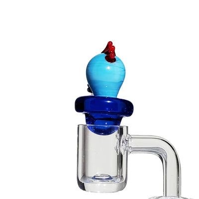 Vibrant blue Mr. Meeseeks carb cap dab rig from Lion Rolling Circus
