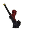 Hand-carved novelty wood pipe shaped like a red devil with a long stem