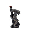 Alien-like figurine holding a wood pipe with a red top from Hand-carved Novelty Wood Pipes