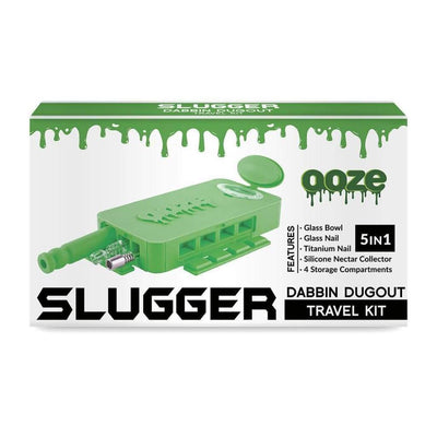 Green container labeled Slugger Dabbin Dugout Travel Kit for a nice clean dab