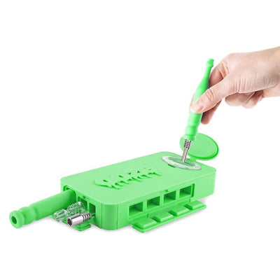 Bright green Ooze Slugger device with screwdriver for a nice clean dab experience