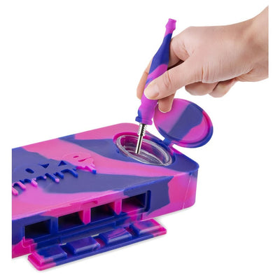 Colorful Ooze Slugger toy with spinning top for a nice clean dab experience