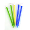 Colorful Plastic Ballpoint Pens Fanned Out Beside a Pencil Glass Dabber Tool For Concentrates