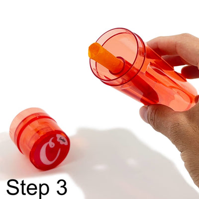 Red plastic bubble wand with smiley cap for pre-roller cone filling & transparent design