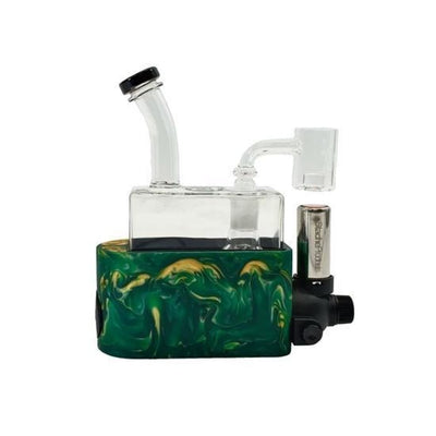 Rio Dab Rig with green and gold base, glass chamber, and quartz banger by Stache Products