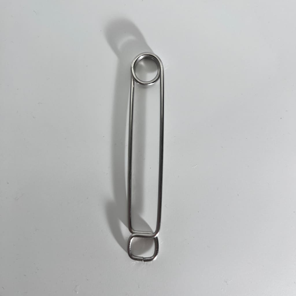 Stainless steel roach clip with silver safety pin shadow