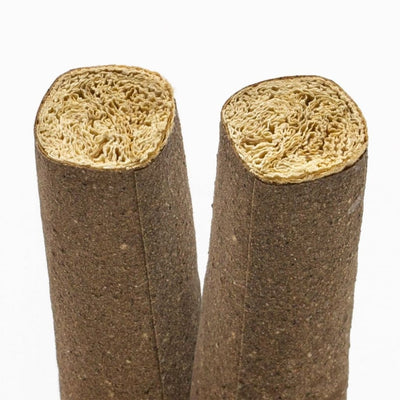 Two loofah sponges with G-Rollz Pet Rock 2x Pre-rolled Organic Hemp Wraps in frame