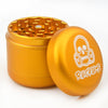 Gold metal herb grinder with skull logo for Ruckus Black 4-Piece and Custom Ruckus Box