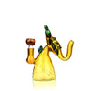 Glass water pipe shaped like a stylized elephant with yellow body, green accents, 14mm male bowl