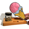 Wooden tray with cannabis jar and ice cream cutout in resealable zipper bags for dry herbs