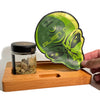 Green alien-shaped rolling tray, resealable zipper seal, dry herb packaging stays fresh