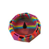 Colorful, octagonal silicone ashtray with swirled rainbow pattern and multiple rests