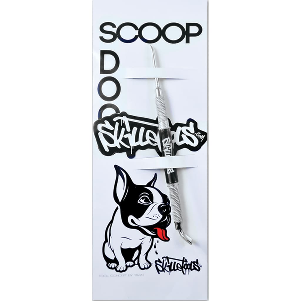 Classic Scoop Skillet Tool With Comfort Grip featuring graffiti-style cartoon dog artwork